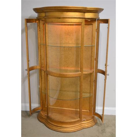 Spotted at the habitat restore … Hollywood Regency Vintage 1960's Serpentine Giltwood Bow Glass Curio Vitrine Cabinet | Chairish