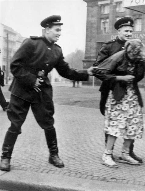 soviet soldiers openly sexually harass a german woman in leipzig 1945 rare historical photos