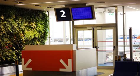 Modern Airport Departure Gate Waiting Area With Gate Number Stock Photo