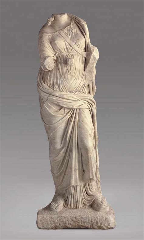 A Roman Over Life Size Marble Statue Of A Draped Woman Circa 1st