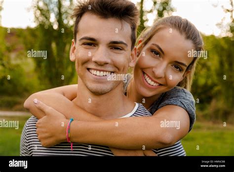 Portrait Of A Happy Young Couple Embraced Together Stock Photo Alamy