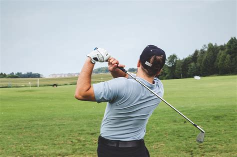 Free Stock Photo Of Golf Swing Follow Through — Hd Images