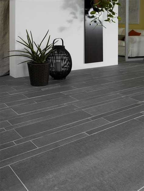 Our light grey floor tiles work great in both smaller and larger spaces, making the surface area of the floor appear larger by the lighter colour. Coloured Grout For Patio Slabs Modern House - Modern House