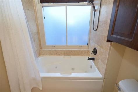 This combination steam shower with jetted tub is a spa experience that will leave no part of your body without pampering. Whirlpool Tub With Shower Combo | Bathtub shower combo ...
