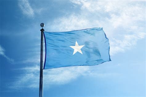 Somalia flag was designed by mohammed awale liban. Premium Photo | Somalia flag on the mast