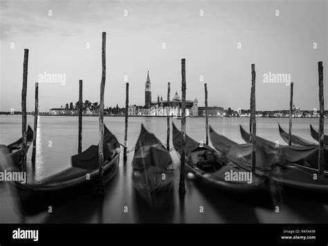 Moving Gondolas On Venice Waterfront San Giorgio Maggiore On The