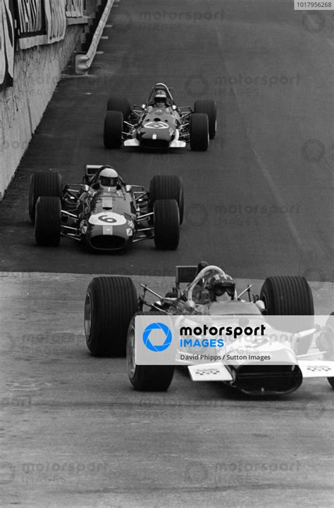 Jo Siffert Lotus 49b Ford Leads Jacky Ickx Brabham Bt26a Ford And