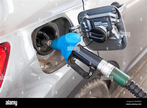 Pumping Gasoline Fuel In Passenger Car At Gas Station Stock Photo Alamy