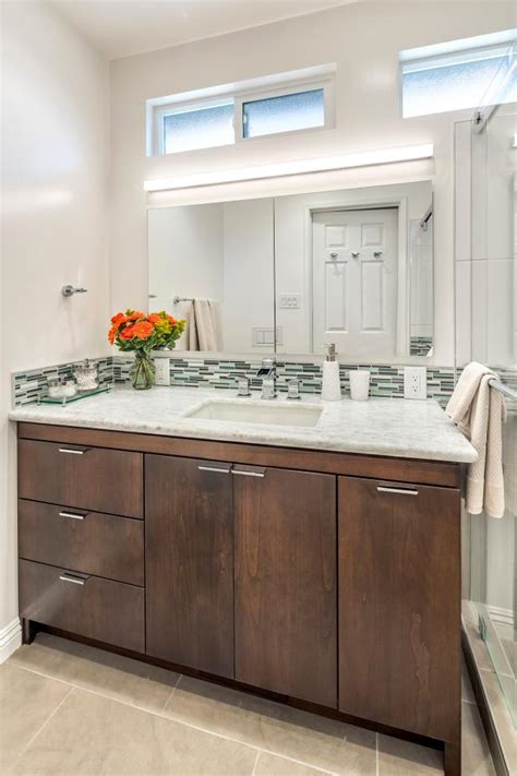 And with today's contemporary bathroom vanity cabinets, it's never been easier to give one of the most used rooms in your house a makeover. Contemporary Bathroom Vanity With Wood Cabinets, Thin Tile ...