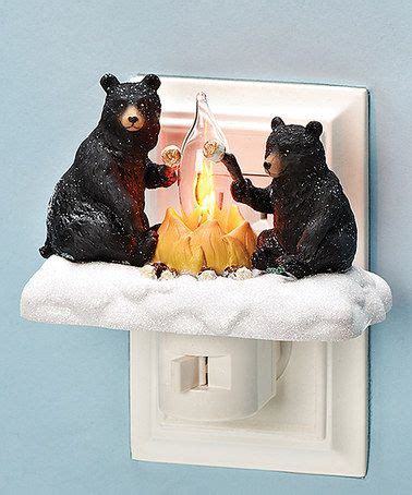 From darling cubs to playful adults, these loveable decorative figurine bears tell stories about special moments and fun times shared with family and friends. Black Bear Campfire Night-Light | Bear bathroom decor ...