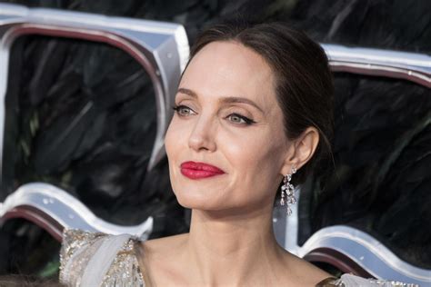 Angelina Jolie Poses Nude On Harpers Bazaar Cover