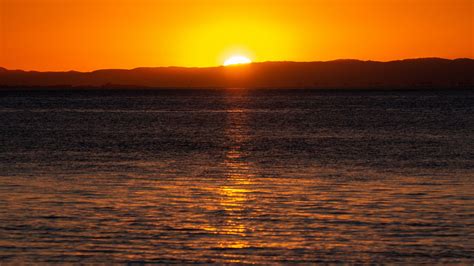Download Wallpaper 1600x900 Sea Horizon Sunset Sun Widescreen 169
