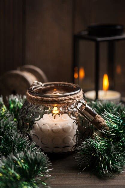 Premium Photo Candles In Lanterns And Christmas Decoration