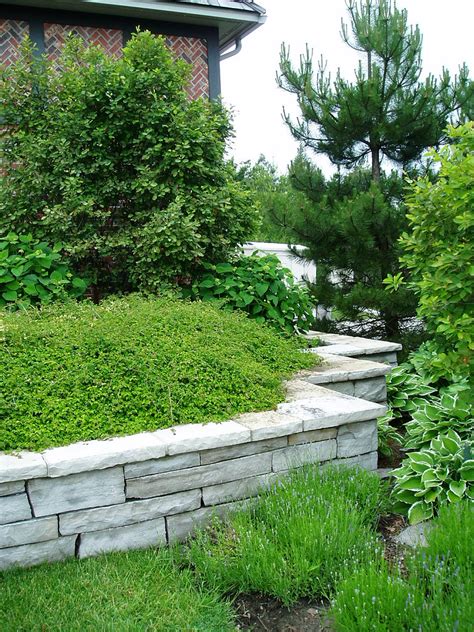 Natural Stone Retaining Wall Lush Green Gardens Are Suppor Flickr