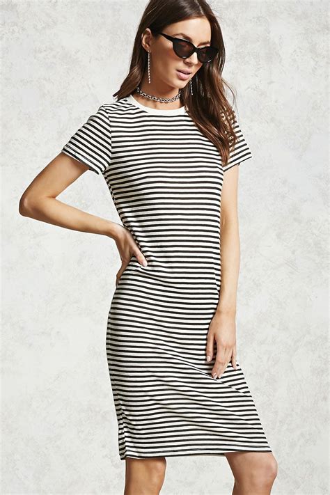 a slub knit dress featuring an allover stripe pattern round neck short sleeves and relaxed