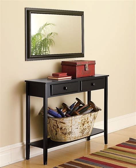 We have a table or two to fit your style, space and sofa. Square Mirror Mount On Beige Wall Behind Black End Table ...