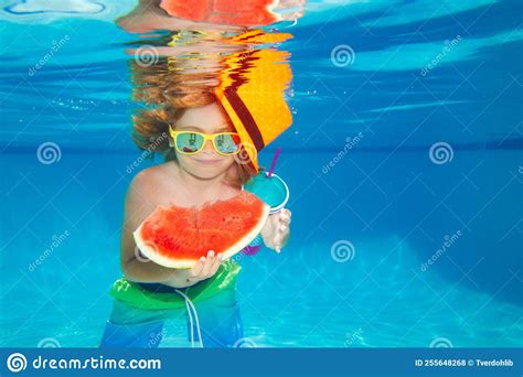 Summer Kids Portrait In Pool Water Young Boy Swim And Dive Underwater