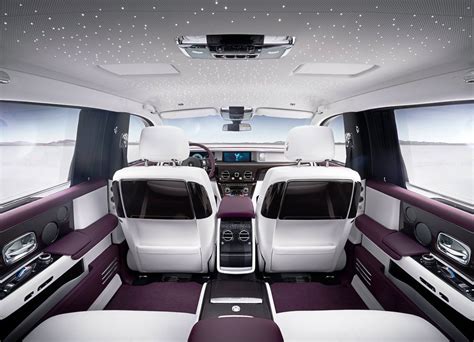 The rear pavilion seats sit higher than the front seats to provide a clearer view of the scenery, assisted by the large glazed side windows and panoramic glass roof. 2018 Rolls-Royce Phantom VIII Interior Images 4K - 2021 ...