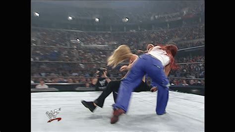 Lita Just Toying With Stacy Keibler Pulling Her Back By The Pants Before Stacys Ultimate