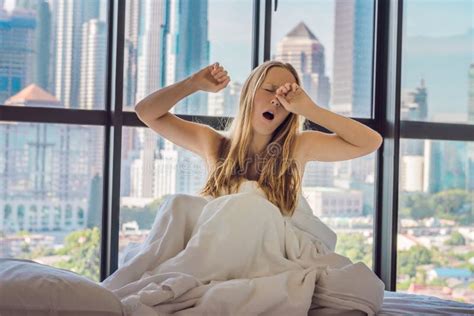 Woman Wakes Up In The Morning In An Apartment In The Downtown Ar Stock Image Image Of Building