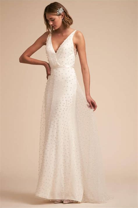 Pearls can be used for centerpieces, table numbers and chair accents. Pearl Wedding Inspiration | Dress for the Wedding