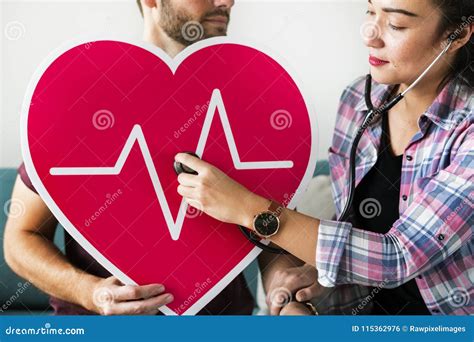 Doctor Checking Patient Heartbeat With Stethoscope Stock Photo Image