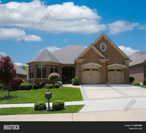 Brick Suburban Home Image And Photo Free Trial Bigstock