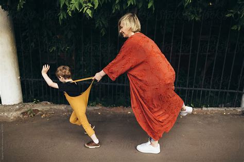 Mother Playing With Little Son By Stocksy Contributor Evgenij Yulkin Stocksy