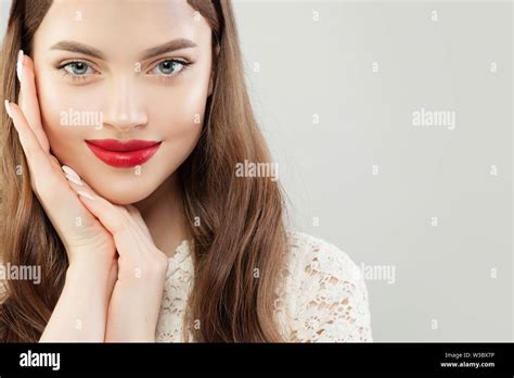 Beautiful Cheerful Woman Model With Clear Skin And Red Lips Makeup
