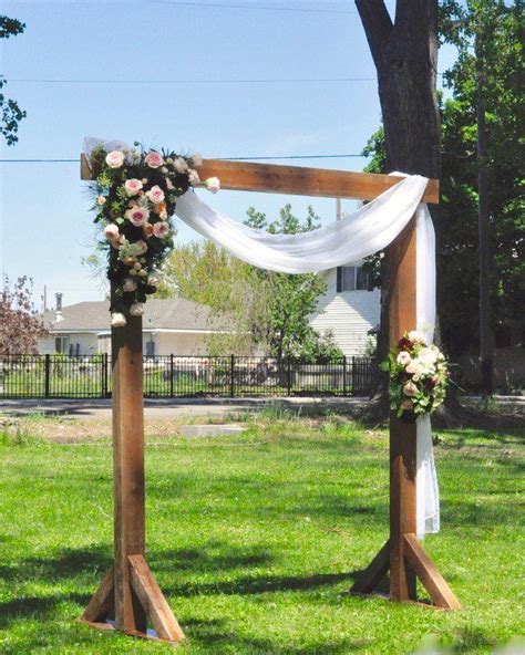Outdoor Wedding Ceremony Arch Idea Wooden Arch With Greenery And