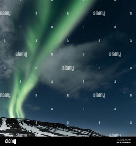 Northern Lights Aurora Borealis Over Mountains Stock Photo Alamy
