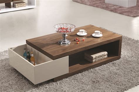 The flawless wooden center table or coffee tables which are of various shapes, sizes and colors would totally transform your living area without any huge investment. Modern tea table designs | Hawk Haven