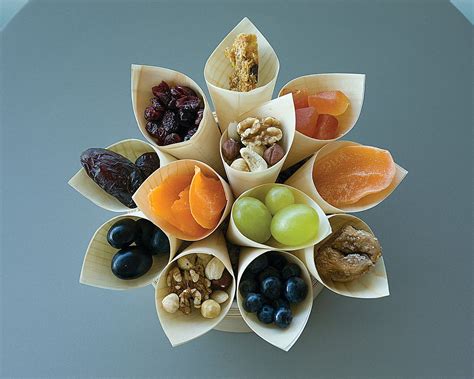 A Choice Of Healthy Snacks From Dried Fruits To A Selection Of Nuts And Berries Food Snacks