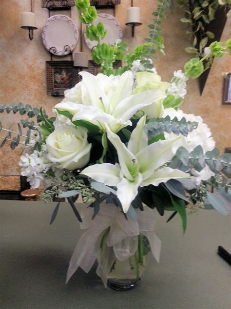 Hours may change under current circumstances Winter look with flowers! Nora Anne's Flower Shoppe Sugar ...
