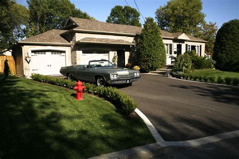 Top floor's a long way up. Driveway and Landscaping by Groupe Paramount | Home ...