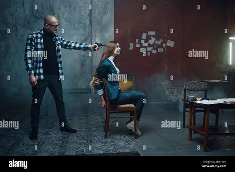 Maniac Kidnapper Puts A Gun To His Victims Head Stock Photo Alamy