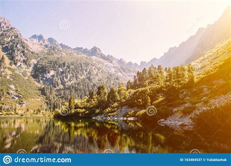 Mountain Lake And Green Forest Picturesque Scenery High Rocks