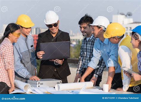 Group Of Engineers And Architects At A Construction Site Stock Image