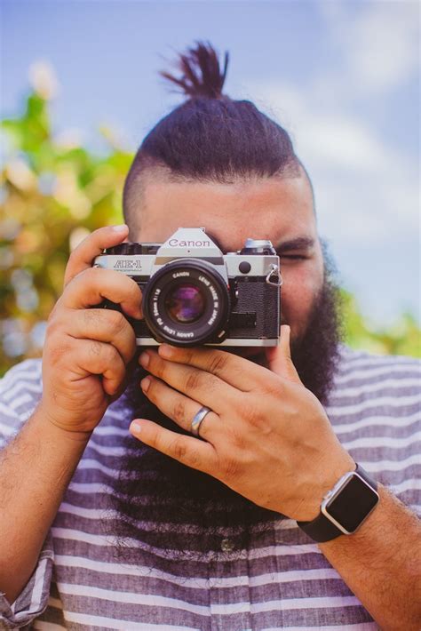 Photo Of Man Holding Camera · Free Stock Photo
