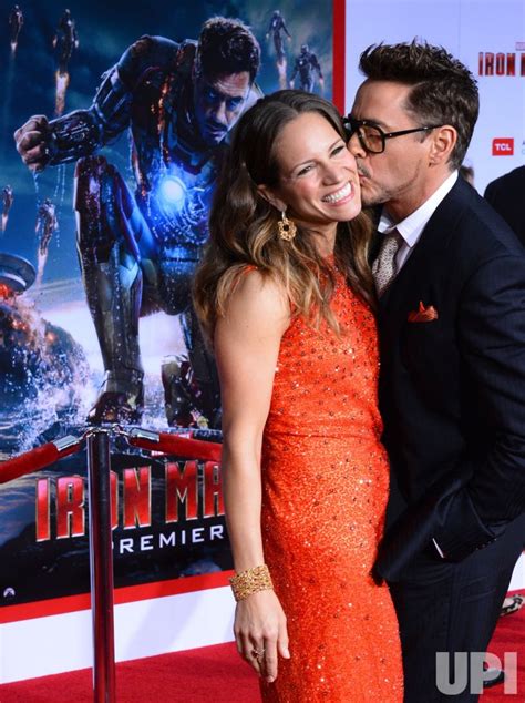 photo robert downey jr and susan downey attend the iron man 3 premiere in los angeles