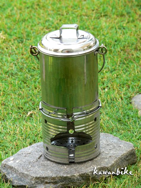 Much safer than a diesel or propane heater. kawanbike: Ultralight DIY Stove - Mini Cook Kit (Update)