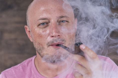 Man Smoking Pipe Portrait Of Middle Aged Man Indoors Stock Image
