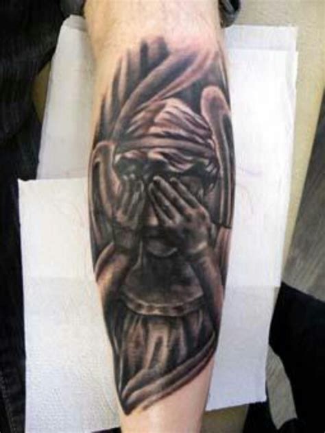 Check which tattoo suits you best. Crying angel tattoo on the hand - Tattooimages.biz