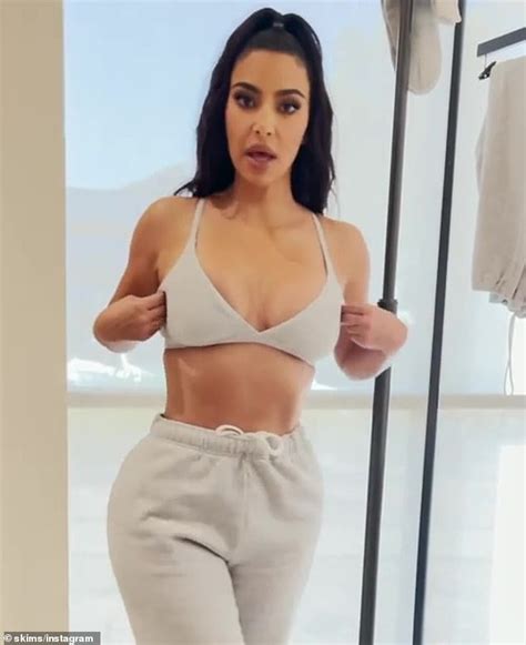 Kim Kardashian Shows Off Her Toned Tummy As She Poses In A Bra Daily