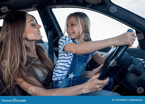 Mom And Her Daughter Driving A Car Stock Image Image Of Learning Daughter 125320949