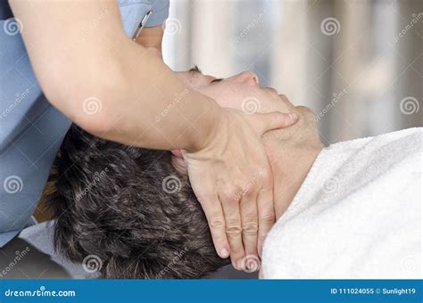 Physiotherapist Chiropractor Is Doing Manipulation Cervical To Stock