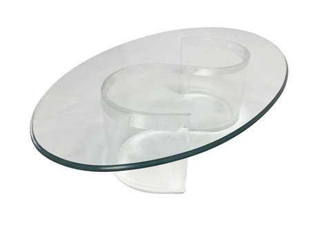 This timeless lucite coffee table will forever be appreciated. Mid-Century Lucite Base Coffee Table - Mecox Gardens