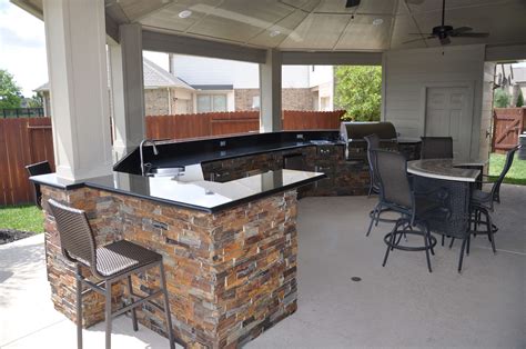 Custom Outdoor Kitchen with Ledger Stone Surround | Outdoor kitchen, Outdoor living, Outdoor