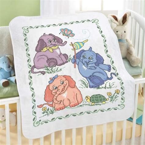 The example shown show a new baby version, but you could write whatever you want in the circle as a full upper and lower case alphabet is included. Baby by Herrschners® Baby Elephants Baby Quilt Stamped ...