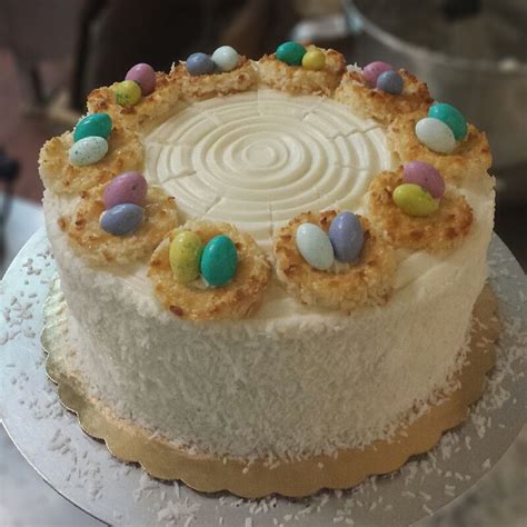Simple four ingredients go into this delicious dessert. Chocolate cake with coconut filling and macaroon birds ...
